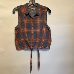Plaid sleeveless button front top